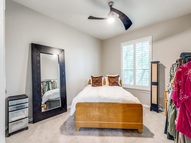 18004 Windflower Way, Dallas, TX 75252 - carpeted bedroom with baseboards and a ceiling fan