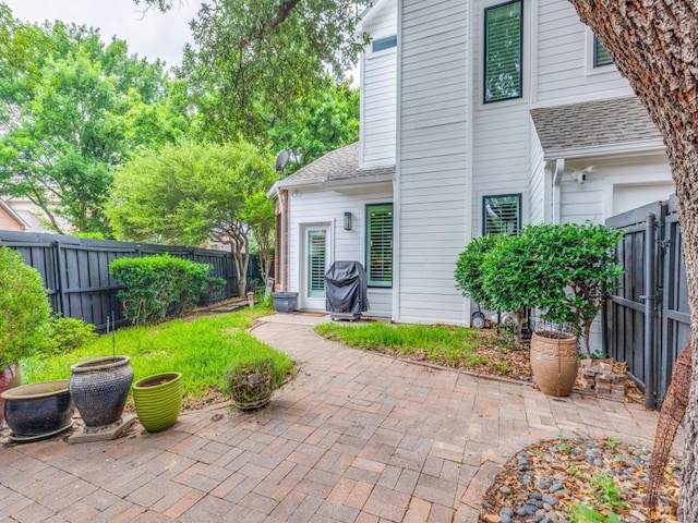 18004 Windflower Way, Dallas, TX 75252 - fenced backyard featuring a patio area and grilling area