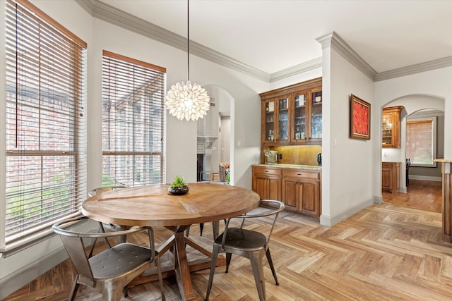 7300 Thames Trl, Colleyville, TX 76034 - dining room featuring arched walkways, ornamental molding, plenty of natural light, and baseboards