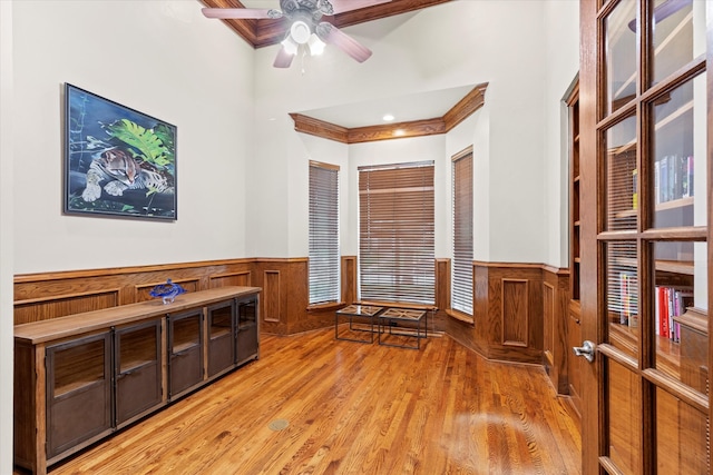 7300 Thames Trl, Colleyville, TX 76034 - unfurnished room with a wainscoted wall, light wood-style flooring, a ceiling fan, and crown molding