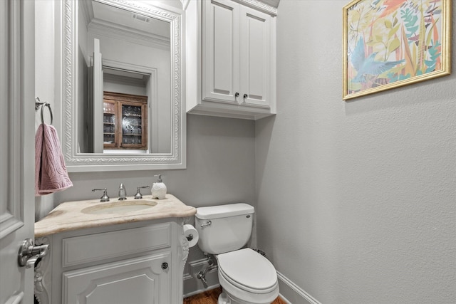 7300 Thames Trl, Colleyville, TX 76034 - bathroom featuring vanity, toilet, ornamental molding, and baseboards