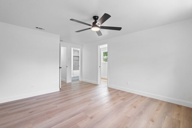 8317 Angier Way, Dallas, TX 75228 - spare room with ceiling fan, baseboards, and light wood-style floors