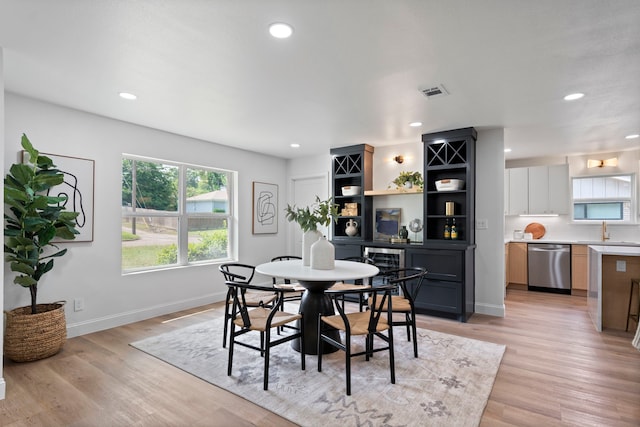 8317 Angier Way, Dallas, TX 75228 - dining room featuring baseboards, light wood-style floors, and recessed lighting