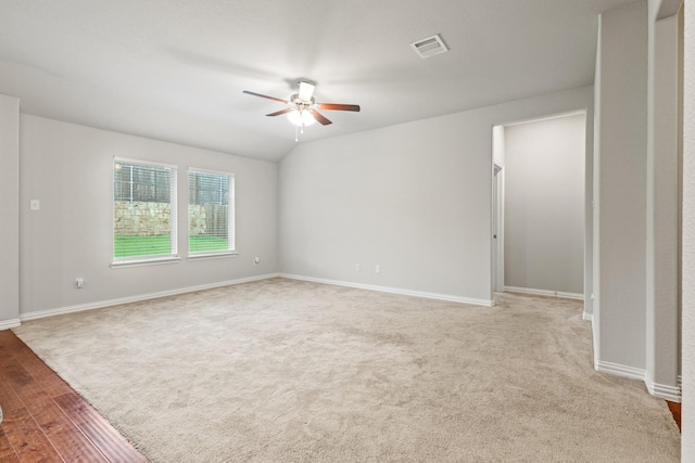 2212 Kingfisher St, Crandall, TX 75114 - carpeted empty room with a ceiling fan, baseboards, and wood finished floors