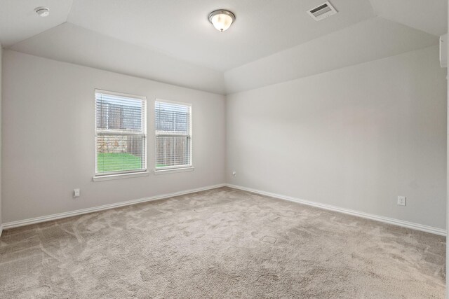 2212 Kingfisher St, Crandall, TX 75114 - spare room with lofted ceiling, carpet floors, a smoke detector, and baseboards