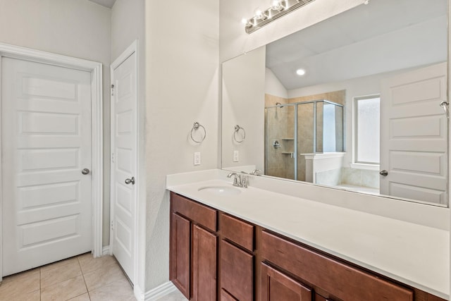 2212 Kingfisher St, Crandall, TX 75114 - full bathroom featuring a shower stall, tile patterned floors, vanity, vaulted ceiling, and baseboards