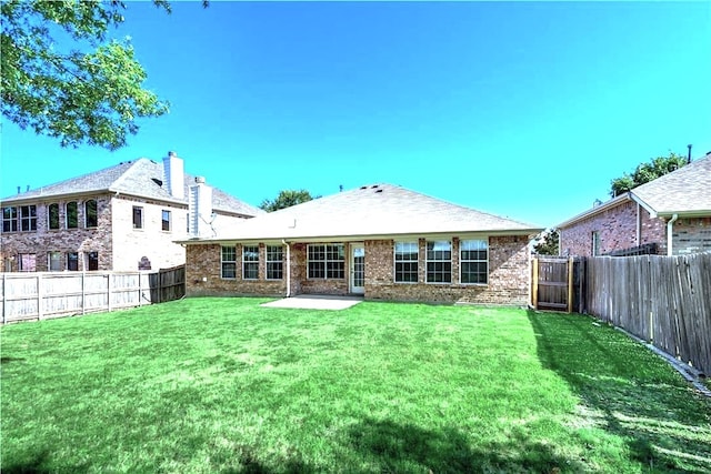 11711 Corsicana Dr, Frisco, TX 75035 - back of property with brick siding, a chimney, and a patio