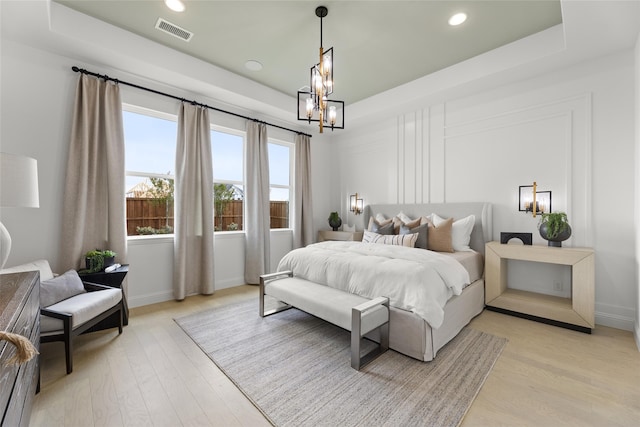 2016 Morris St, Rockwall, TX 75087 - bedroom with light wood-style floors, recessed lighting, a chandelier, and baseboards