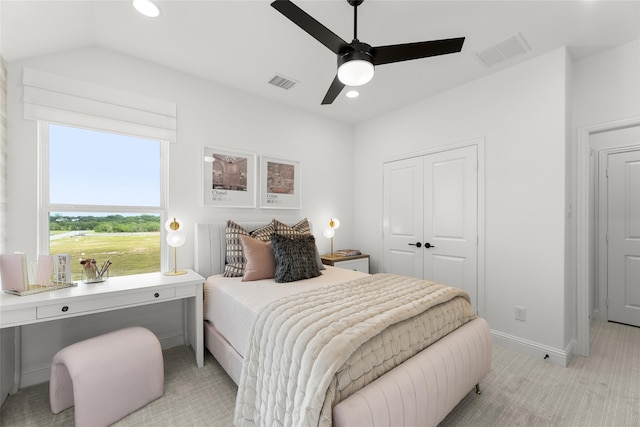 2016 Morris St, Rockwall, TX 75087 - bedroom with light colored carpet, a closet, baseboards, vaulted ceiling, and a ceiling fan