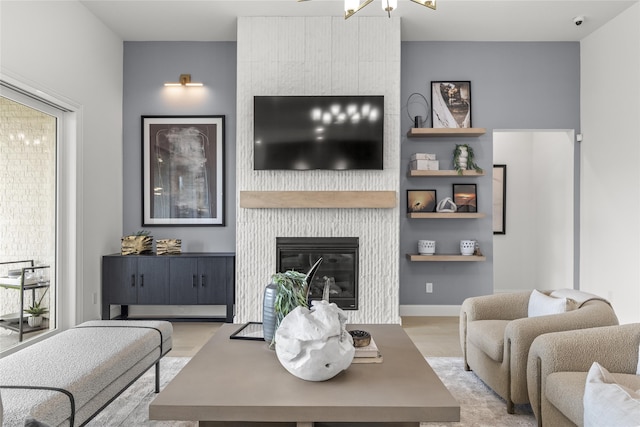 2016 Morris St, Rockwall, TX 75087 - living room featuring a large fireplace and wood finished floors