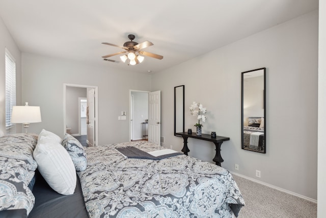 11487 Balcones Dr, Frisco, TX 75033 - carpeted bedroom with baseboards and ceiling fan