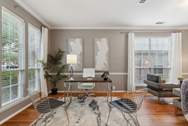 11487 Balcones Dr, Frisco, TX 75033 - office with healthy amount of natural light, wood finished floors, crown molding, and baseboards