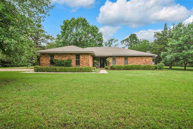 674 Milam Rd, Van Alstyne, TX 75495 - ranch-style home featuring a front yard and brick siding