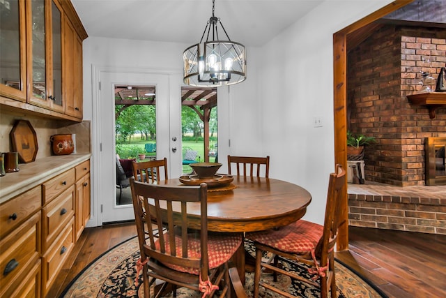 674 Milam Rd, Van Alstyne, TX 75495 - dining space with dark wood-style floors and a chandelier