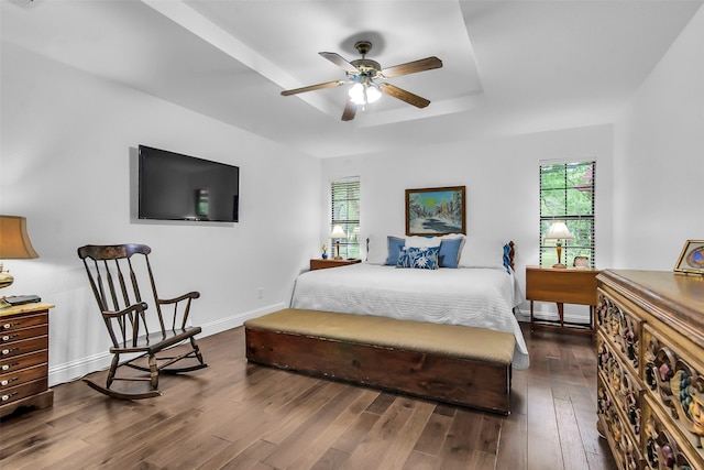 674 Milam Rd, Van Alstyne, TX 75495 - bedroom with dark wood-type flooring, a raised ceiling, and baseboards