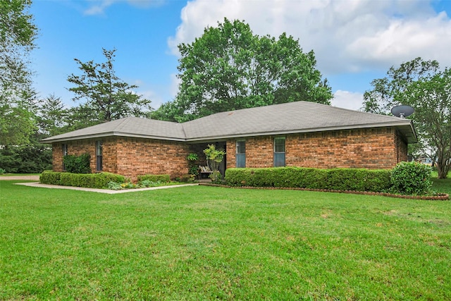 674 Milam Rd, Van Alstyne, TX 75495 - single story home featuring brick siding and a front yard
