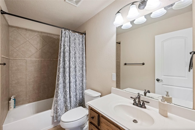 2112 Beaver Creek Ln, Southlake, TX 76092 - bathroom featuring toilet, vanity, shower / tub combo, and a textured wall