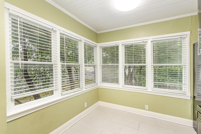210 S Rosemont Ave, Dallas, TX 75208 - unfurnished sunroom featuring baseboards, plenty of natural light, tile patterned flooring, and ornamental molding