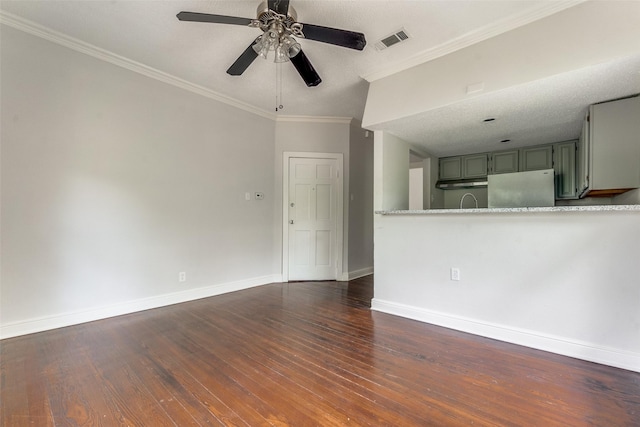210 S Rosemont Ave, Dallas, TX 75208 - unfurnished living room featuring dark wood-type flooring, baseboards, a ceiling fan, and ornamental molding