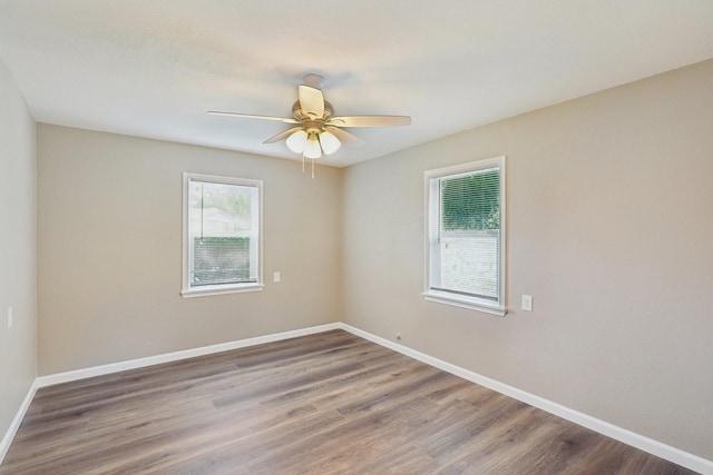6405 Waynewood Ct, Fort Worth, TX 76135 - empty room featuring wood finished floors, ceiling fan, and baseboards