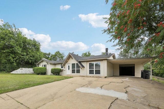 6405 Waynewood Ct, Fort Worth, TX 76135 - view of front facade with driveway, a front yard, and an attached carport