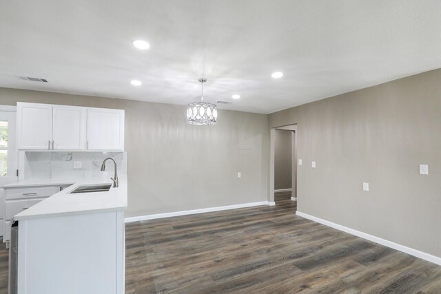 6405 Waynewood Ct, Fort Worth, TX 76135 - kitchen with a sink, white cabinets, recessed lighting, light countertops, and baseboards