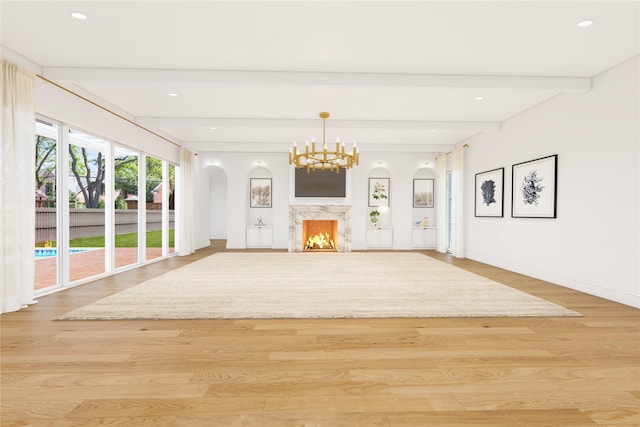 4021 Southwestern Blvd, University Park, TX 75225 - unfurnished living room featuring light wood-style floors, beamed ceiling, a chandelier, recessed lighting, and a fireplace