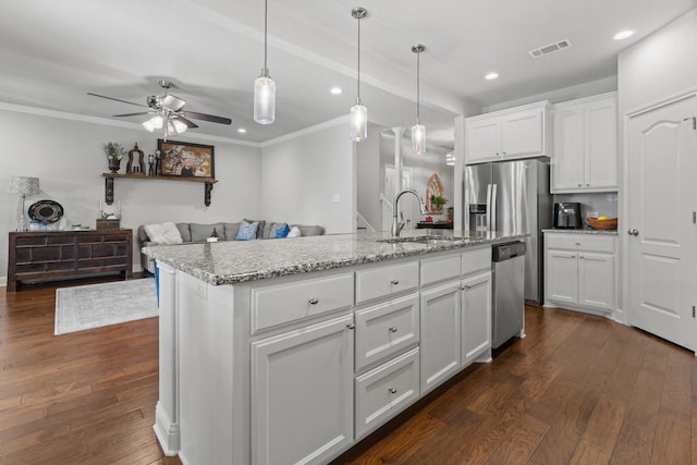 1761 Stillwater Dr, Burleson, TX 76028 - kitchen with a sink, stainless steel dishwasher, ceiling fan, recessed lighting, and ornamental molding