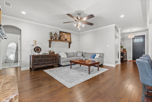1761 Stillwater Dr, Burleson, TX 76028 - living area featuring a ceiling fan, arched walkways, dark wood-style floors, baseboards, and plenty of natural light
