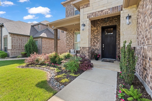 1761 Stillwater Dr, Burleson, TX 76028 - entrance to property with brick siding, a lawn, a porch, and stone siding