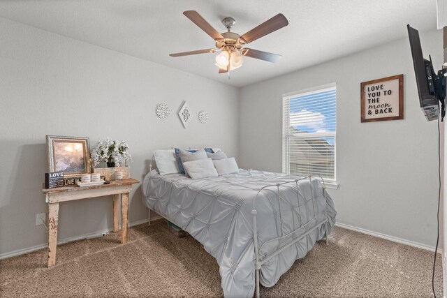 1761 Stillwater Dr, Burleson, TX 76028 - bedroom featuring baseboards, carpet, and a ceiling fan
