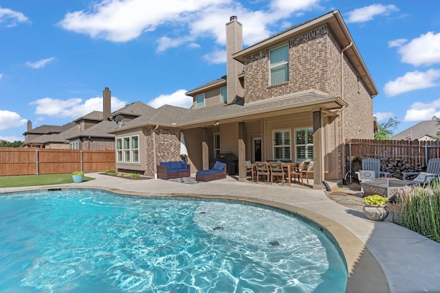 1761 Stillwater Dr, Burleson, TX 76028 - view of swimming pool featuring a patio area, a fenced backyard, a grill, and an outdoor living space