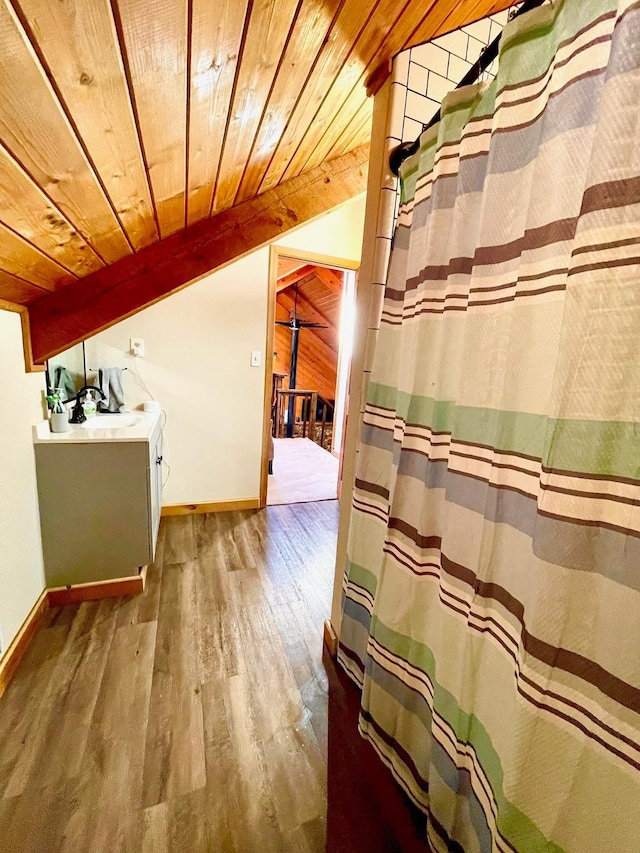 307 S King Lake Rd, Scroggins, TX 75480 - full bath featuring wood ceiling, wood finished floors, lofted ceiling, baseboards, and vanity