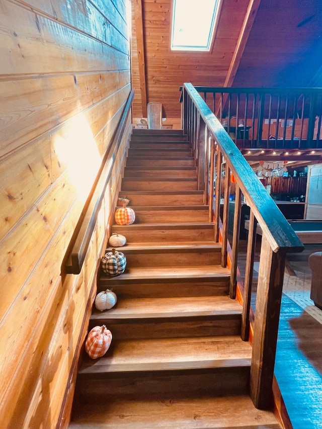 307 S King Lake Rd, Scroggins, TX 75480 - stairs featuring wood walls and wood finished floors