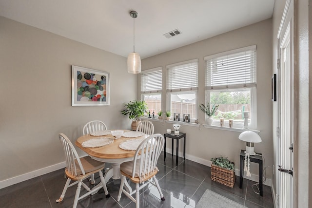 5309 Chatsworth Ln, Fort Worth, TX 76244 - dining room with baseboards and dark tile patterned flooring