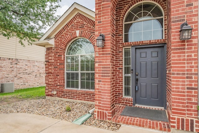 5309 Chatsworth Ln, Fort Worth, TX 76244 - doorway to property with brick siding and cooling unit