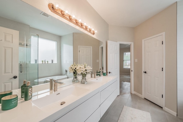 5309 Chatsworth Ln, Fort Worth, TX 76244 - bathroom with a stall shower, a freestanding bath, double vanity, and tile patterned floors