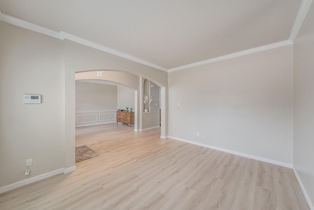 5309 Chatsworth Ln, Fort Worth, TX 76244 - unfurnished room featuring arched walkways, light wood finished floors, ornamental molding, and baseboards