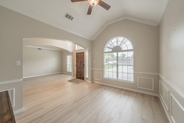 5309 Chatsworth Ln, Fort Worth, TX 76244 - spare room featuring a ceiling fan, light wood-style flooring, arched walkways, crown molding, and vaulted ceiling