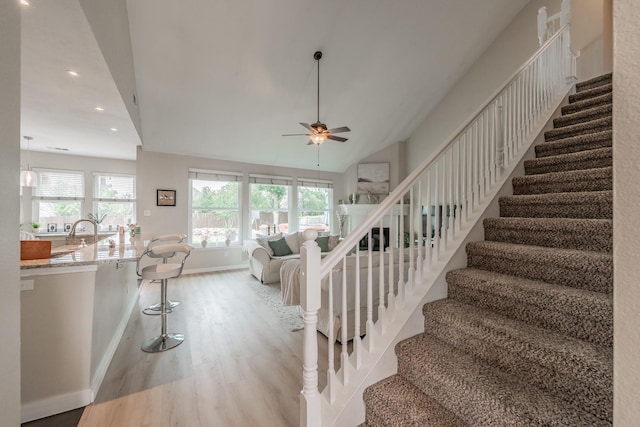 5309 Chatsworth Ln, Fort Worth, TX 76244 - stairway with ceiling fan, wood finished floors, baseboards, recessed lighting, and lofted ceiling