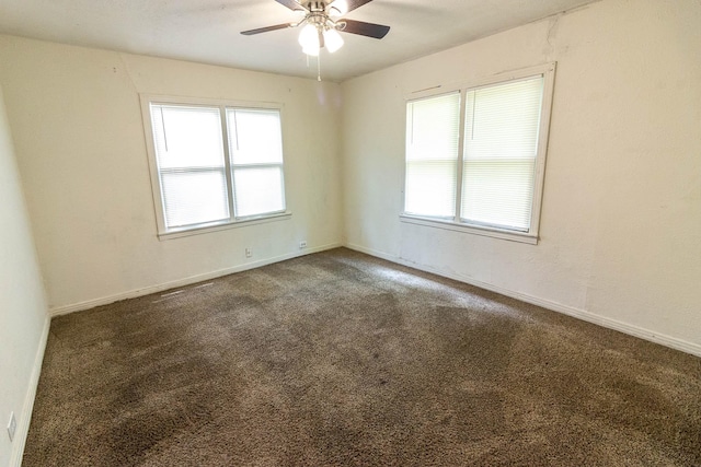 1708 S Jefferson St, Kaufman, TX 75142 - carpeted empty room with ceiling fan and baseboards
