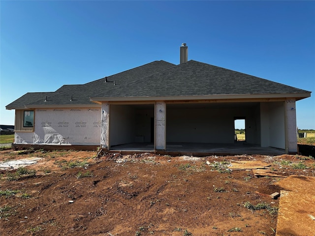 6414 Windmill Grass Ln, Abilene, TX 79606 - rear view of property with a shingled roof