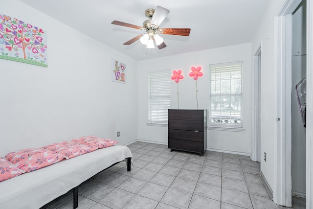 13063 Whiterock Rd, Mabank, TX 75147 - bedroom featuring baseboards, a ceiling fan, and light tile patterned floors