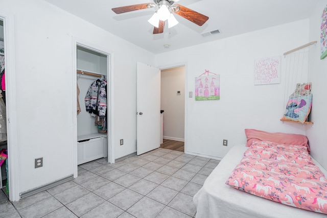 13063 Whiterock Rd, Mabank, TX 75147 - bedroom with light tile patterned floors, ceiling fan, and a closet