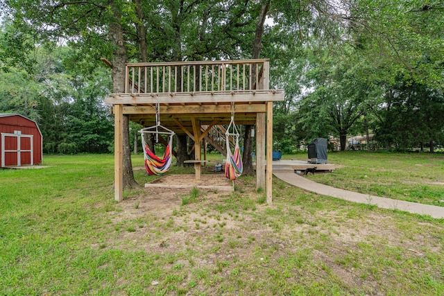 13063 Whiterock Rd, Mabank, TX 75147 - back of house featuring a lawn, a wooden deck, view of scattered trees, and stairs
