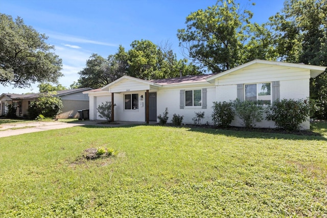 5509 Cloverdale Dr, Fort Worth, TX 76134 - single story home featuring a front lawn, an attached garage, and driveway