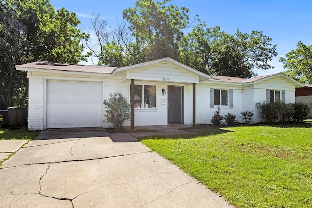 5509 Cloverdale Dr, Fort Worth, TX 76134 - ranch-style house featuring driveway, brick siding, a front yard, and an attached garage