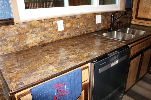 206 W Dewey St, Malakoff, TX 75148 - kitchen with dishwasher, a sink, decorative backsplash, and dark countertops