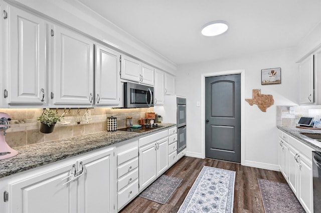 1705 W Belden St, Sherman, TX 75092 - kitchen featuring stainless steel appliances, white cabinetry, decorative backsplash, and light stone countertops