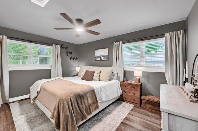 1705 W Belden St, Sherman, TX 75092 - bedroom featuring wood finished floors and a ceiling fan